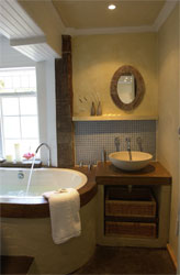 Modern bathroom with extra large oval bath tub.
